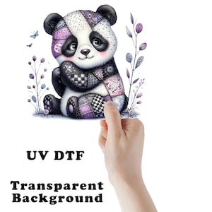May include: A cute panda bear illustration with a patchwork design in black, white, and purple. The panda is sitting with its paws clasped, surrounded by floral accents and butterflies. The text "UV DTF" and "Transparent Background" are below the panda.