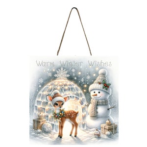 May include: A wooden sign with a winter scene featuring a snowman, a deer, and an igloo. The sign has a string attached for hanging and the text "Warm Winter Wishes" at the top.