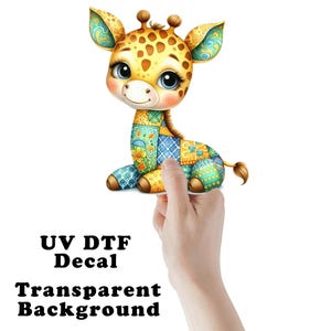 May include: A cute cartoon giraffe with a patchwork design in shades of blue, yellow, and green. The giraffe is sitting on a white background. The text "UV DTF Decal Transparent Background" is written below the giraffe.