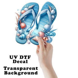 May include: A blue flip-flop decal with white stripes and adorned with seashells in shades of orange, white, and blue. The text "UV DTF Decal Transparent Background" is visible.