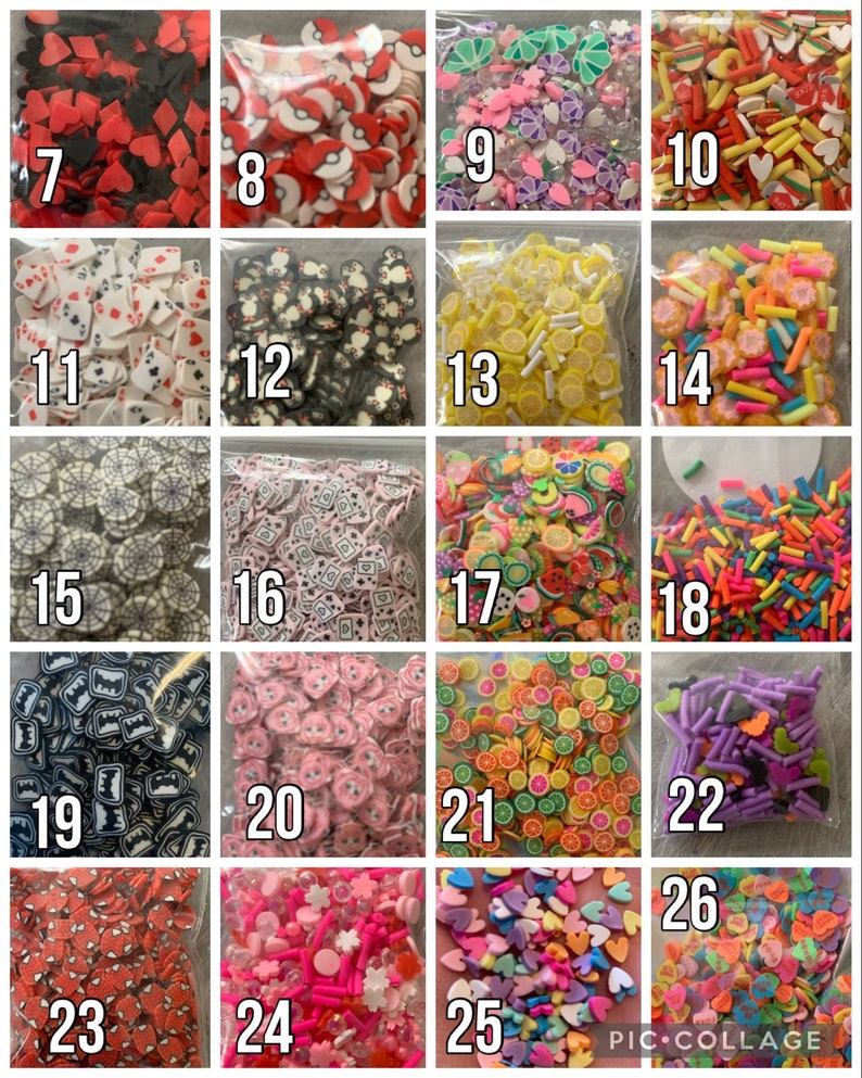 May include: A collection of 26 small bags filled with colorful, themed, and decorative sprinkles. The sprinkles are arranged in a grid pattern and numbered 7 through 26. The sprinkles include hearts, stars, flowers, lemons, and other shapes.