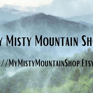 May include: Image features the text "My Misty Mountain Shop" in a black, stylized font, set against a backdrop of a misty mountain landscape. Below, the Etsy shop URL is displayed.