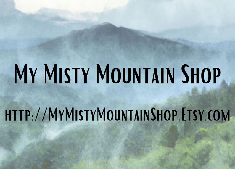 May include: Image features the text "My Misty Mountain Shop" in a black, stylized font, set against a backdrop of a misty mountain landscape. Below, the Etsy shop URL is displayed.