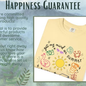 May include: A yellow t-shirt with a graphic design of a sun, a camera, a crab, a seashell, and a flamingo. The text "got my mind on summer" is written in a circle around the graphic.