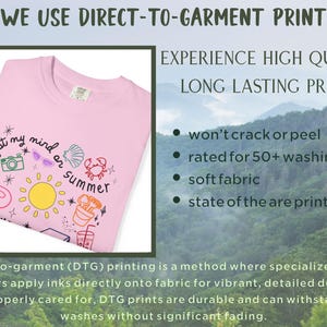 May include: Pink t-shirt with a graphic print of a sun, a seashell, a crab, a camera, sunglasses, and a beach bag. The text "got my mind on summer" is printed on the shirt.  Direct-to-garment (DTG) printing is a method where specialized inkjet printers apply inks directly onto fabric for vibrant, detailed designs. When properly cared for, DTG prints are durable and can withstand many washes without significant fading.