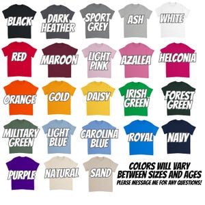 May include: A collection of t-shirts in various colors, including black, red, and blue. Each shirt displays a different color name in a bold, white font. The text "COLORS WILL VARY BETWEEN SIZES AND AGES" is also visible.