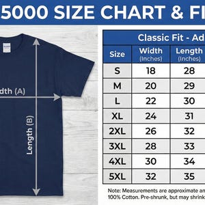 May include: Navy blue Gildan 5000 t-shirt with size chart and fit guide. The chart shows measurements in inches for width and length, ranging from 18" to 32" width and 28" to 35" length. The shirt is 100% cotton.