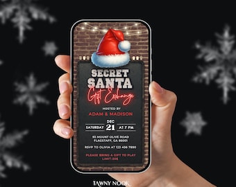 以下が含まれることがあります： スマートフォンには、Secret Santaギフト交換のデジタル招待状が表示されています。招待状には赤いサンタ帽子、イベントの詳細、および「Secret Santa Gift Exchange」というテキストが表示されています。背景はレンガの壁です。