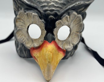 Owl mask. Owl bird handmade mask of papier mache. Venetian mask and Halloween mask .