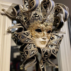 Venetian Jester mask in black velvet with gold. Wearable mask and home decor mask.