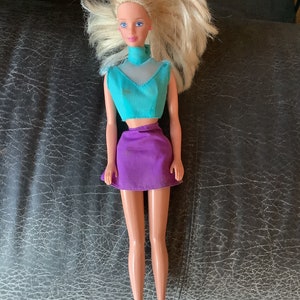 Barbie 1966 body and 1991 head.