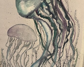 May include: Watercolor painting of two jellyfish in shades of blue, purple, and green. The jellyfish have long, flowing tentacles and are set against a background of aquatic plants. The artwork is signed in the bottom right corner.