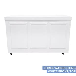 May include: A white cabinet with three wainscoting panels on the front. The top is also white. The cabinet is on wheels. The text "THREE WAINSCOTING WHITE FRONT/TOP" is at the bottom.