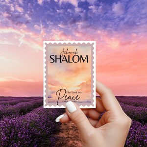 May include: A rectangular sticker with a stamp-like border features the words "Jehovah Shalom" and "The Lord my Peace" in elegant script. The background shows a sunset sky and a field of lavender.
