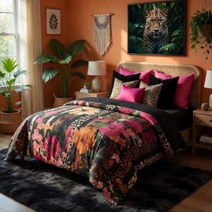 May include: A bedroom scene featuring a bed with a floral and leopard print comforter. The bed is adorned with pink and black pillows. A framed leopard portrait hangs above the bed. The room has orange walls and decorative plants.