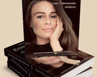 May include: A stack of four paperback books with a black cover and white text. The title of the book is "Erinnerungen der Zukunft" by Falko Petruschke. The book is described as a "spirituell-wissenschaftlicher Roman".