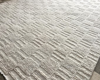 Handgeknoopt wollen vloerkleed 8 x 10 ivoor getextureerd modern minimaal handgemaakt duurzaam groot tapijt