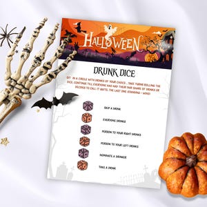 May include: Halloween-themed drinking game card with a spooky illustration of a graveyard, a haunted house, and a pumpkin. The card includes instructions for a dice game with six different outcomes: skip a drink, everyone drinks, person to your right drinks, person to your left drinks, nominate a drinker, and take a drink.