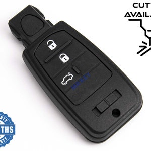 Op de afbeelding: Zwarte autosleutel met vergrendel-, ontgrendel- en kofferbakontgrendelingsknoppen. De sleutel heeft de tekst "MR KEY" en "CUTTING AVAILABLE". Er wordt ook een garantie van 6 maanden weergegeven.