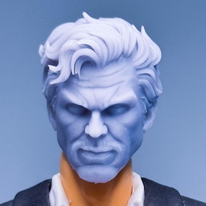 May include: A detailed action figure head with a stern expression. The figure has light blue skin, white hair, and is wearing a white collared shirt and a black suit jacket. The background is a solid light blue.