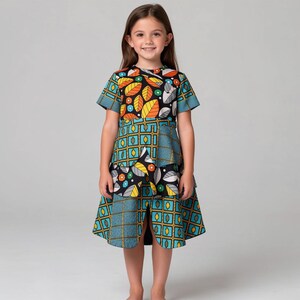 Handmade Ankara Girls Dress: Vibrant African Print, Geometric Leaf Pattern.