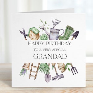 May include: A white card with a watercolor illustration of gardening tools, including a watering can, rake, shovel, and gloves. The text "Happy Birthday to a very special Grandad" is printed on the card.