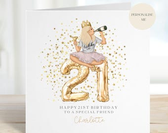 May include: A birthday card with a gold glitter background and a cartoon illustration of a woman wearing a crown and a "Birthday Girl" shirt, sitting on a gold balloon number 21. The card says "Happy 21st Birthday to a Special Friend Charlotte".