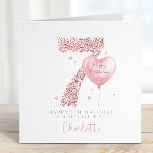 May include: A square birthday greeting card featuring a large number 7 rendered in rose gold glitter texture. A light pink heart-shaped balloon with the text Happy Birthday is attached to the number. Below, the text reads Happy 7th Birthday to a special niece and the name Charlotte in pink script.