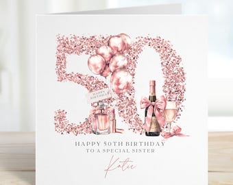 May include: A white greeting card with a rose gold glitter "50" design, balloons, perfume, champagne, and a glass. The card reads "Happy 50th Birthday To A Special Sister" with the name "Katie" in cursive.