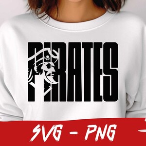 May include: A white sweatshirt with a black graphic design that says "PIRATES" with a pirate skull and crossbones in the "P".