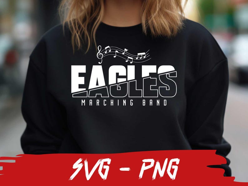 Pu&ograve; includere: Felpa nera con testo bianco che recita "Eagles Marching Band" e note musicali sopra il testo.