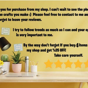 May include: A yellow wall with a message thanking customers for their purchase and offering a discount for buying 4 items. The message also encourages customers to leave reviews. There are five yellow stars below the message. The wall is decorated with a cactus and a plant in pink pots. A laptop, a glass of orange juice, a vase with a yellow flower, and a silver thermos are on a wooden table in front of the wall.