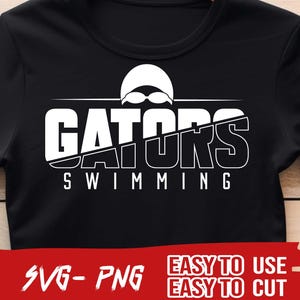 May include: Black t-shirt with white text that reads "GATORS SWIMMING" and a white silhouette of a swimmer wearing a swim cap and goggles.