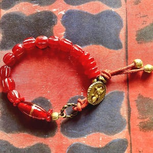 Unique African ethnic red handmade bracelet, antique Murano trade bead, artisan glass beads, antique brass Adinkra bead