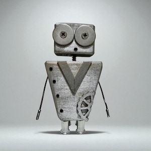 May include: A handcrafted robot sculpture made from wood and metal. The robot has a rectangular head with large, round eyes made from screws. Its V-shaped body features a gear detail and wire arms. The robot stands on two metal legs.