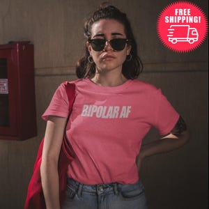 SEEDS. BIPOLAR AF. Minimal Unisex T-Shirt with World Changing message. Share these words and make a change!