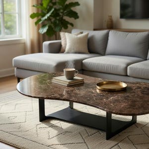 May include: A white ceramic mug with a black handle and the text "But First, Coffee" in a black, handwritten-style font. The mug is on a white surface.