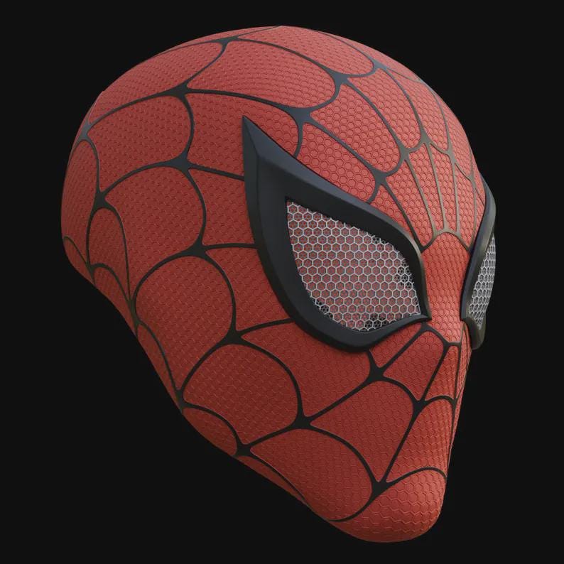 May include: A red and black Spider-Man mask with a textured surface and black web pattern. The eye openings are outlined in black and feature a honeycomb mesh design. The mask is a cosplay or costume accessory.