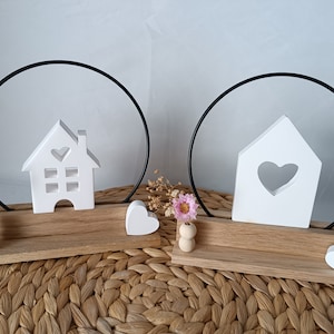 Decorative stand - metal ring on a wooden stand with a house, heart and dried flowers