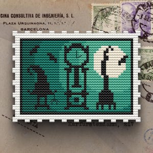 May include: A rectangular cross-stitch pattern on a white perforated border featuring a teal background with black stitched silhouettes of a pointed hat, a tall grandfather clock, and a round moon with a black silhouette of a cat sitting on it.