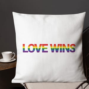 Love Wins pillow | Colorful, modern graphic design pillow with rainbow flag colors | Modern, vibrant, cool and simple graphic for gay gifts