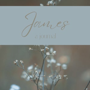 May include: A close-up of a journal with the title "James, a journal" written in cursive script. The background is a blurred image of white flowers.