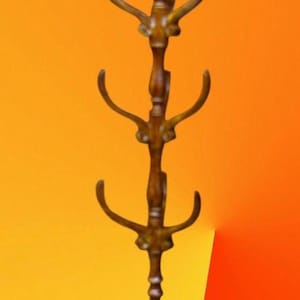 May include: A set of three ceramic mugs with a speckled, matte finish. The mugs are in shades of cream, light gray, and dark gray. Each mug has a simple, minimalist design and a rounded handle. The mugs are suitable for coffee, tea, or other beverages.