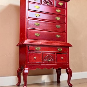 red mahogany dresser Traditional or cherry with a mirror, likely produced in the mid-20th century (circa 1930s1950s) as part of the Colonial Revival movement. It features a rich, red-toned finish and characteristic ornate dresser and the mirror frame from our Cayuta 6 Piece Bedroom Set Red Painted Antique Mahogany Dresser