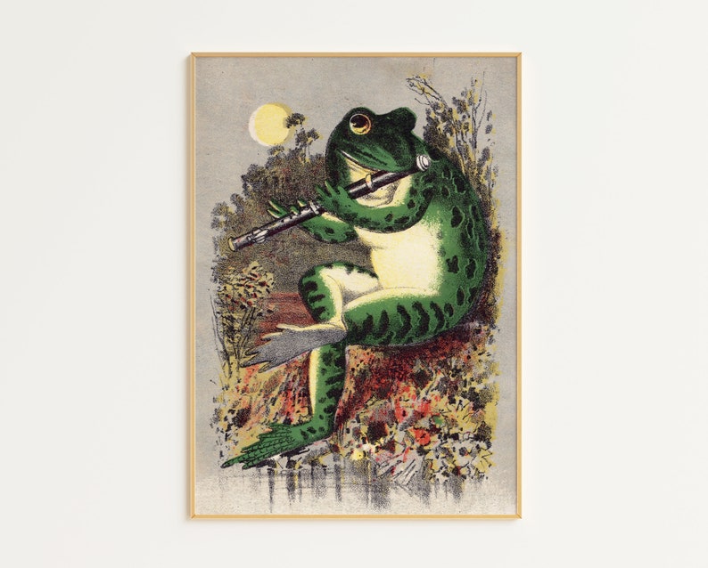May include: A green frog playing a flute in a whimsical illustration. The frog is sitting on a rock surrounded by flowers and leaves. The background is a light blue sky with a moon.