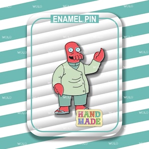 May include: Enamel pin featuring a cartoon character with a red head and arms, wearing a light green coat and pants. The pin includes the text "HAND MADE" and "ENAMEL PIN". The background has a white and teal striped pattern.