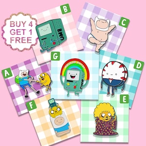 May include: A set of ten Adventure Time enamel pins featuring various characters from the show, including Finn, Jake, BMO, and Marceline. The pins are displayed on a pink and white checkered background. The text "BUY 4 GET 1 FREE" is displayed in a glittery pink and white circle.