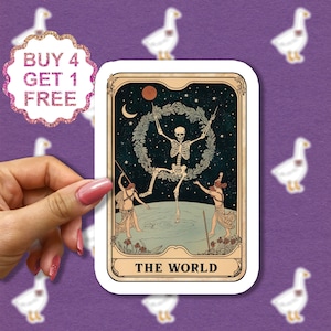 May include: A tarot card with a white background and a vintage-style illustration of a skeleton dancing in a wreath of leaves. The card is titled "The World".