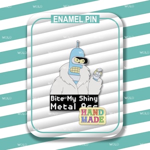 May include: Enamel pin featuring a light blue robot character with a white fur coat, holding a small object. The pin includes the text "Bite My Shiny Metal A**" and "HAND MADE".