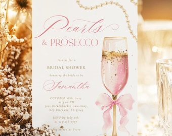 May include: A bridal shower invitation with a pink and gold design. The invitation features a glass of champagne with a pink ribbon and gold glitter. The text on the invitation reads "Pearls & Prosecco" and includes the bride's name, date, time, and location.